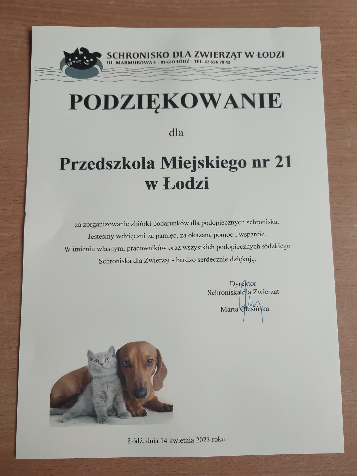 Zdjęcie dyplomu z podziękowaniami od schroniska dla zwierząt w Łodzi na ulicy Marmurowej dla Przedszkola Miejskiego nr 21 w Łodzi